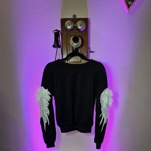 Black Sweater with White Lace Wing Design